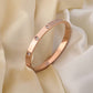 Sleek Elegance: 18K Rose Gold Plated Bangle with Crystal Accents RGB209 - The Soul Jewellery