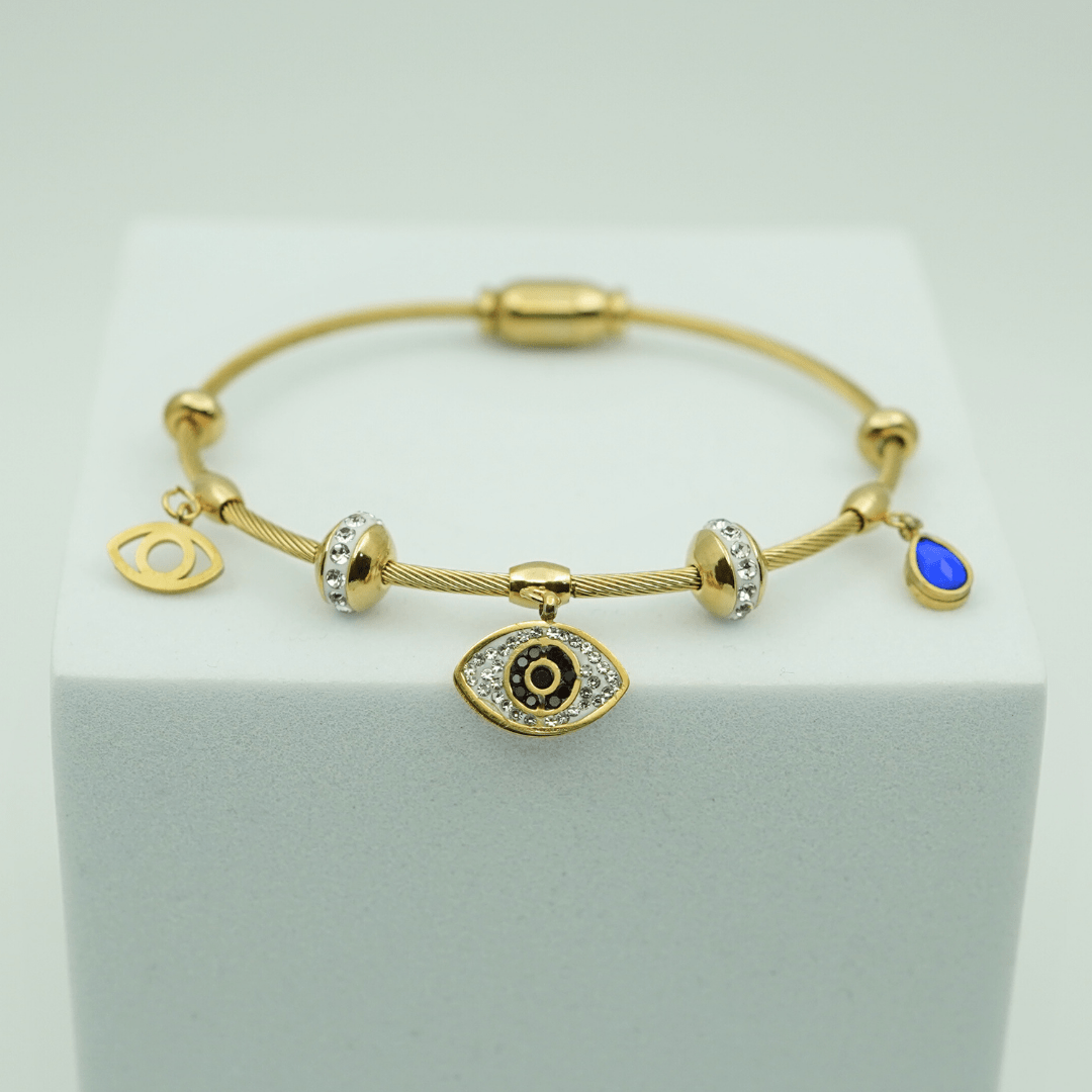 Elegant Gold - Plated Evil Eye Charm Bangle with Crystal Accents and Blue Teardrop Pendant RGB401 - The Soul Jewellery
