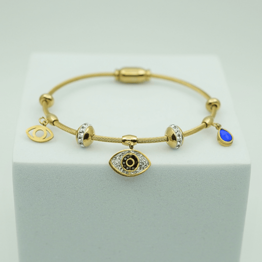 Elegant Gold - Plated Evil Eye Charm Bangle with Crystal Accents and Blue Teardrop Pendant RGB401 - The Soul Jewellery