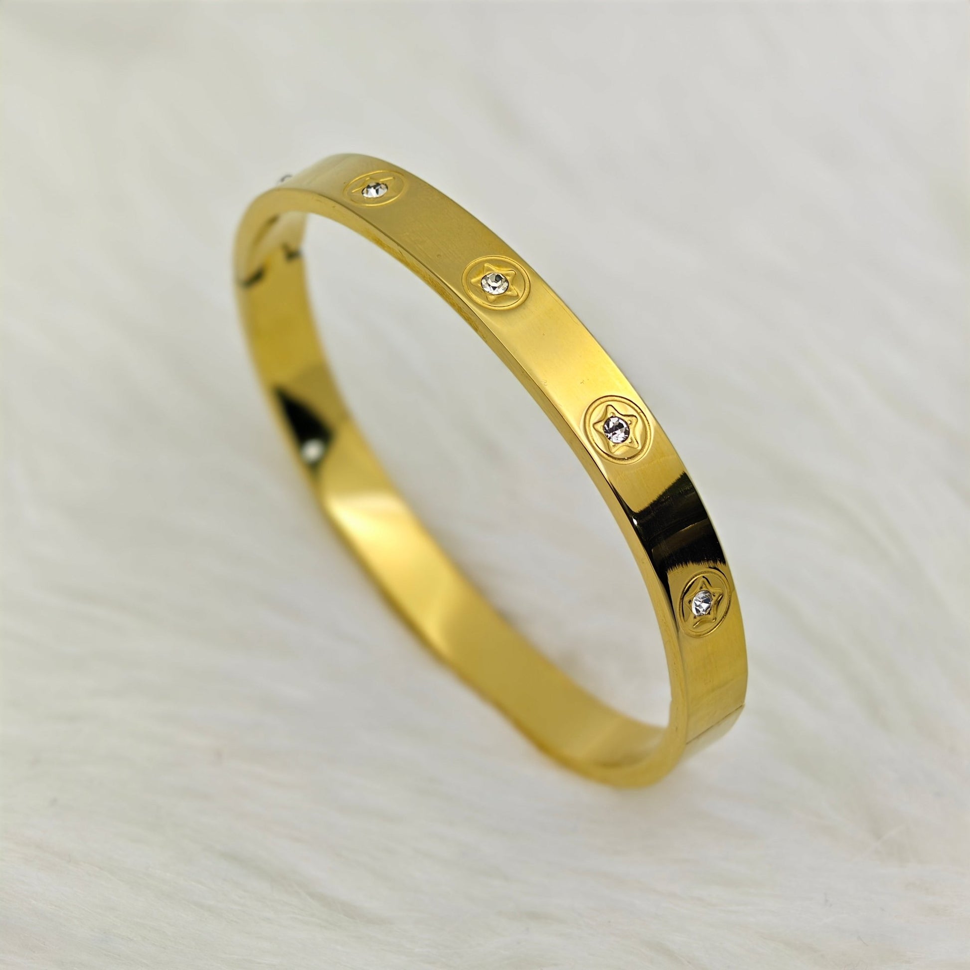 Luxury 18K Gold - Plated Screw Motif Bracelet – Anti - Tarnish Stainless Steel Bangle with CZ  Accents- The Soul Jewellery