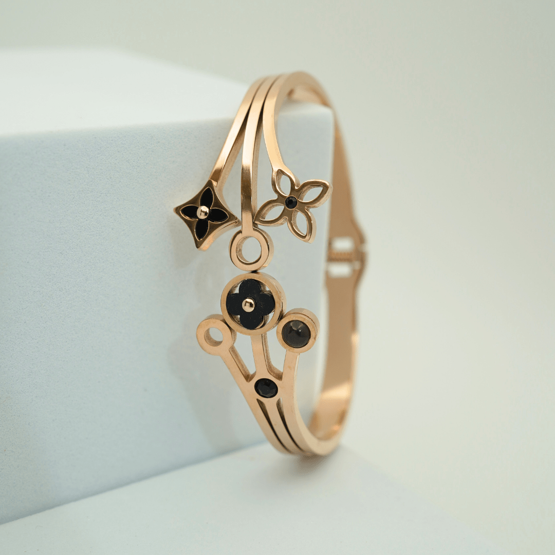 Luxury 18K Rose Gold Plated Anti - Tarnish Floral Charm Bangle with Black Enamel Accents – Elegant Openable Design RGB306 - The Soul Jewellery