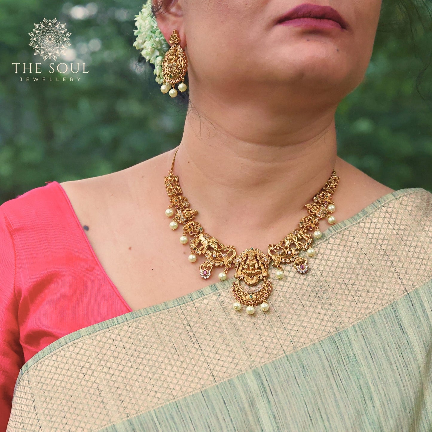 Mavisha Antique Matte Gold Plated Short Necklace Set with Lakshmi Idol, Elephant & Peacock Design - The Soul Jewellery