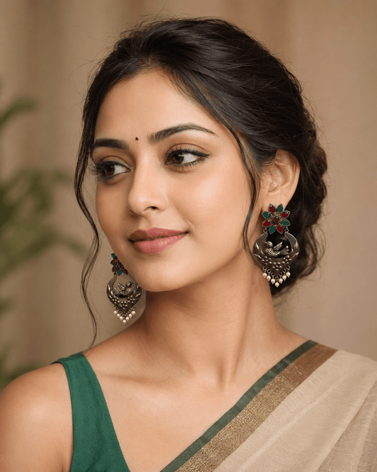 Bird Nest Motif Silver Lookalike Earring with Red and Green Stones and Pearl Drops for Women - The Soul Jewellery