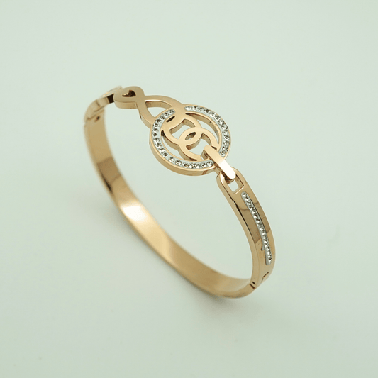 18K Rose Gold - Plated Anti - Tarnish Bangle with Engraved Chanel - Inspired Logo and Sparkling Crystal Halo Accents - The Soul Jewellery