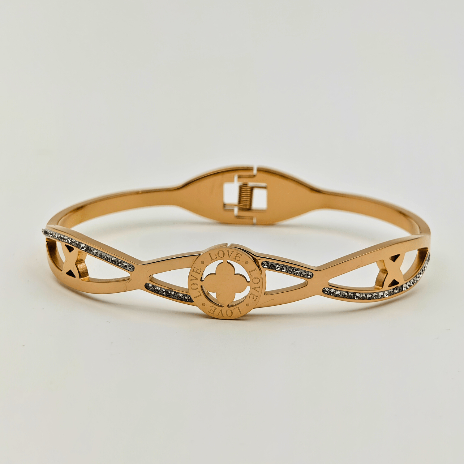Elegant Harmony: 18K Gold Plated Bangle with Interlocking Charms and CZ Details RGB207 - The Soul Jewellery