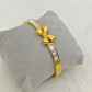 Luxury 22K Gold-Plated Bow Bracelet – Anti-Tarnish Stainless Steel Bangle with Baguette CZ for Women - The Soul Jewellery